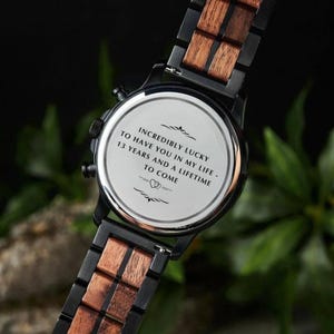Engraved wooden watch back showing custom personalization, Walnutwood men’s watch, meaningful wedding or anniversary gift