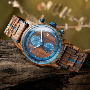 Custom zebrawood watch for men with engraving brown blue face close up