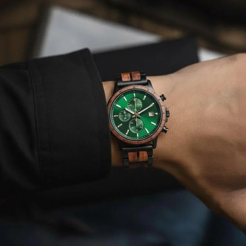 Wearing on wrist personalized wooden watch for men showing artisan wood texture, engraved men’s wristwatch gift idea