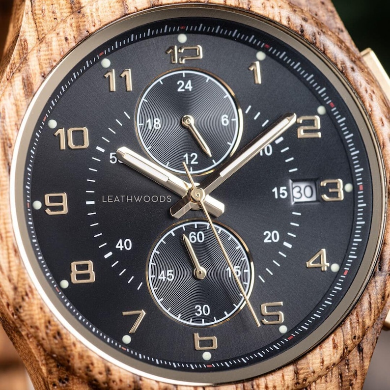 Close Dial view of handmade zebrawood wooden watch, stainless steel case and wooden strap men’s wrist watch