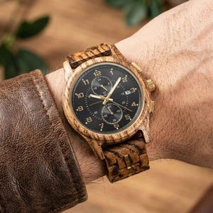 Man wearing personalized wooden watch on hand, handmade zebrawood wrist watch gift for him