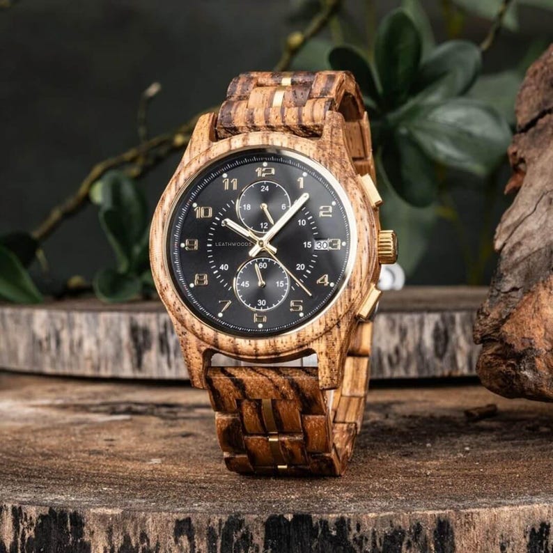 Front view of personalized wooden watch for men, handmade zebrawood wrist watch with brown and black dial and gold markers
