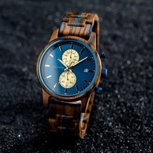 Side angle view of engraved wooden watch for men showing slim 11.8mm case and natural wood grain detail