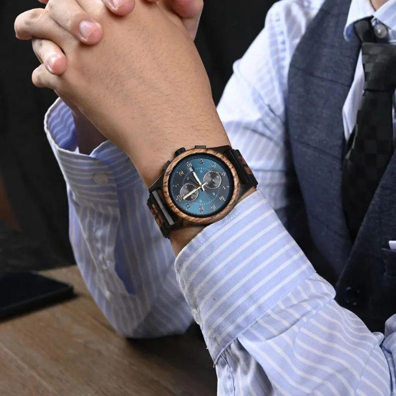 Men wearing Raven wooden watch on wrist, personalized wooden watch gift for groom, husband, or anniversary