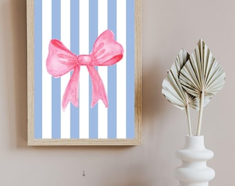 Lámina de arte de pared con lazo rosa y fondo de rayas azules y blancas
