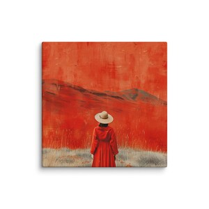 May include: A canvas print depicting a person in a red coat and a straw hat, set against a vibrant red backdrop with a mountain range. The person stands in a field of tall grass. The artwork has a textured, painterly style.