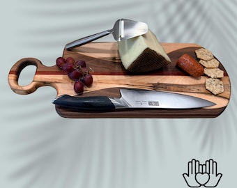 Beautiful boards, handcrafted for your table — and every dollar goes to families in need.