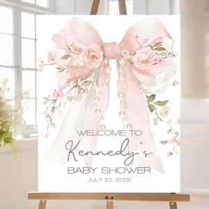 Plantilla de cartel de bienvenida para baby shower con lazo rosa y perlas, póster de bienvenida editable e imprimible con diseño de flores silvestres, descarga digital instantánea.