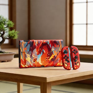 May include: A Nintendo Switch console and controllers with a dragon design. The console and controllers feature a red, orange, and blue colour scheme. The dragon artwork is set against a fiery background, creating a dynamic and eye-catching aesthetic.