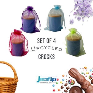 May include: Set of four upcycled crocks in blue, purple, and green, each with a wooden lid and wrapped in a sheer bag. The crocks are displayed with Easter-themed decorations, including a chocolate bunny and colorful candies.