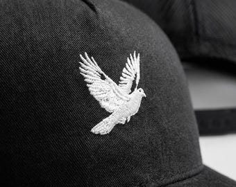 Embroidered Dove Trucker Hat | Minimalist Black 5-Panel Cap