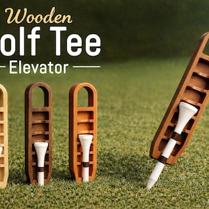 May include: Wooden Golf Tee Elevator. Three wooden holders in light, medium, and dark brown, each with a white golf tee. The text "Wooden Golf Tee Elevator" is at the top of the image.