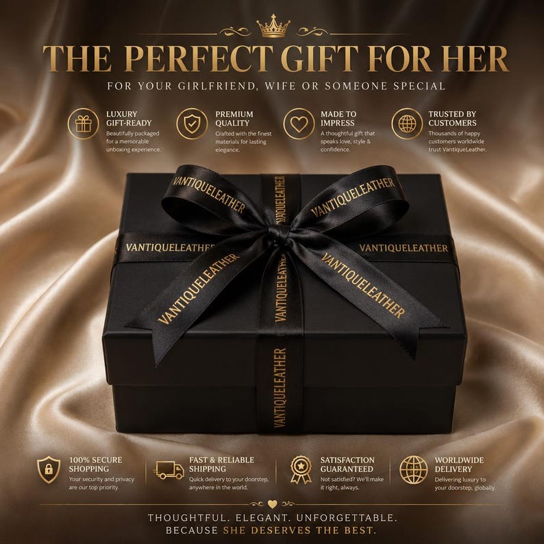May include: A square black gift box tied with a black satin ribbon featuring the gold text VANTIQUELEATHER. The box is centered with text above and below including THE PERFECT GIFT FOR HER, THOUGHTFUL, ELEGANT, UNFORGETTABLE, BECAUSE SHE DESERVES THE BEST.