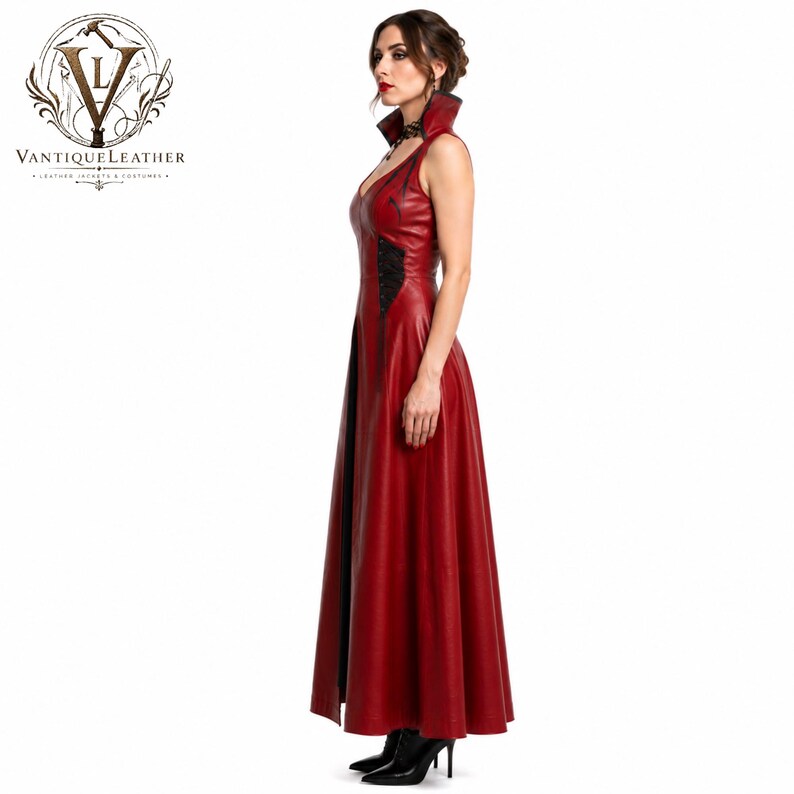May include: A floor-length sleeveless red leather dress featuring a high collar, black lace-up side detailing, and a V-neckline. The garment is fitted through the bodice and flares into a full skirt, showcasing a smooth texture and clean lines.