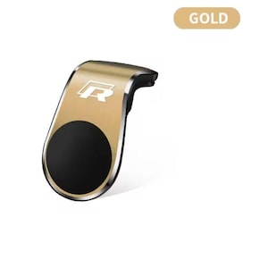 以下が含まれることがあります： 黒い円形の磁気ベースを備えた、金色の車の電話ホルダー。 ホルダーは湾曲したデザインで、シルバーの「R」ロゴが特徴です。「GOLD」という単語が、右上隅の金の長方形に表示されています。