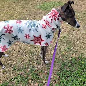 Greyhound Fleece Coat: Green and Red Snowflakes on Cream Fleece, 12 inch neck Snood, Adjustable Strap. Ships Fast and Free!