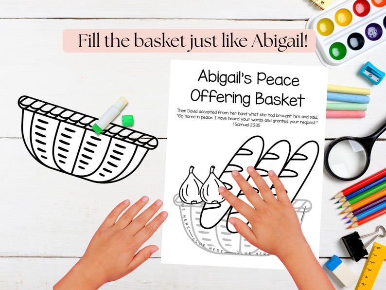 May include: Black and white line drawing of a basket with the text "Fill the basket just like Abigail!" and "Abigail's Peace Offering Basket". The image includes illustrations of bread and figs, with hands interacting with the drawing.