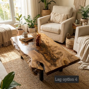 May include: A large, live-edge wooden coffee table with a glossy finish. The table has a natural, organic shape and sits on black legs. The surrounding living room features neutral-toned furniture, plants, and a woven rug. The text "Leg option 4" is visible.