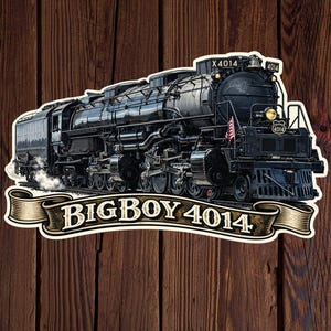 May include: A black Big Boy 4014 steam locomotive sticker with the text "BIGBOY 4014" on a banner. The sticker features a detailed illustration of the train, with the American flag visible. The background is a wooden surface.