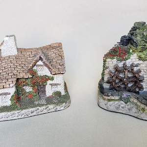 Two vintage David Winter cottage houses