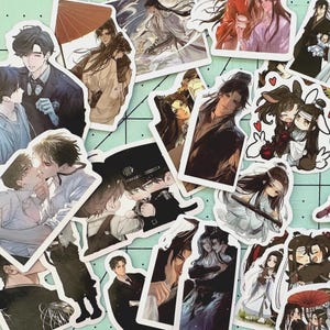 May include: A collection of assorted die-cut stickers featuring various anime-style illustrations of characters in diverse outfits, including traditional robes, modern suits, and uniforms, with some designs depicting intimate pairs and others showing chibi figures.