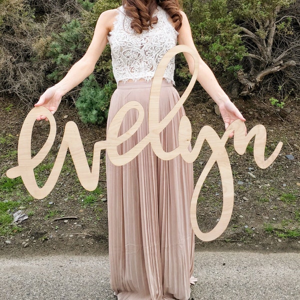 Stor laserskuren tränamnskylt