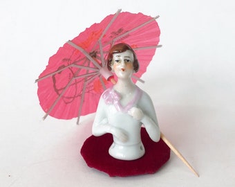 Lovely Pink Bow Flapper Lady Umbrella Pin Cushion Half Doll Brush Top Woman Figurine Ceramic Porcelain Vintage Art Deco Germany