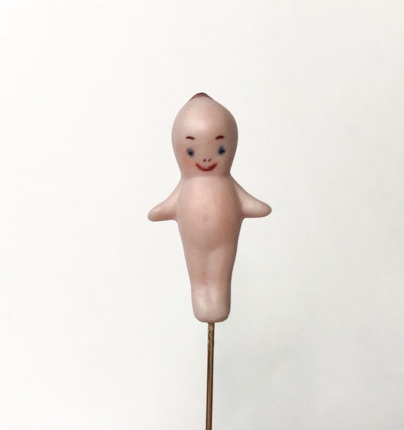 cupie doll on a stick