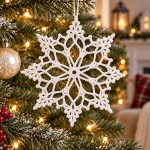 May include: A white crocheted snowflake ornament with an intricate, symmetrical geometric pattern featuring a central ring and radiating points, suspended by a thin white string for hanging on a tree branch during the holiday season.