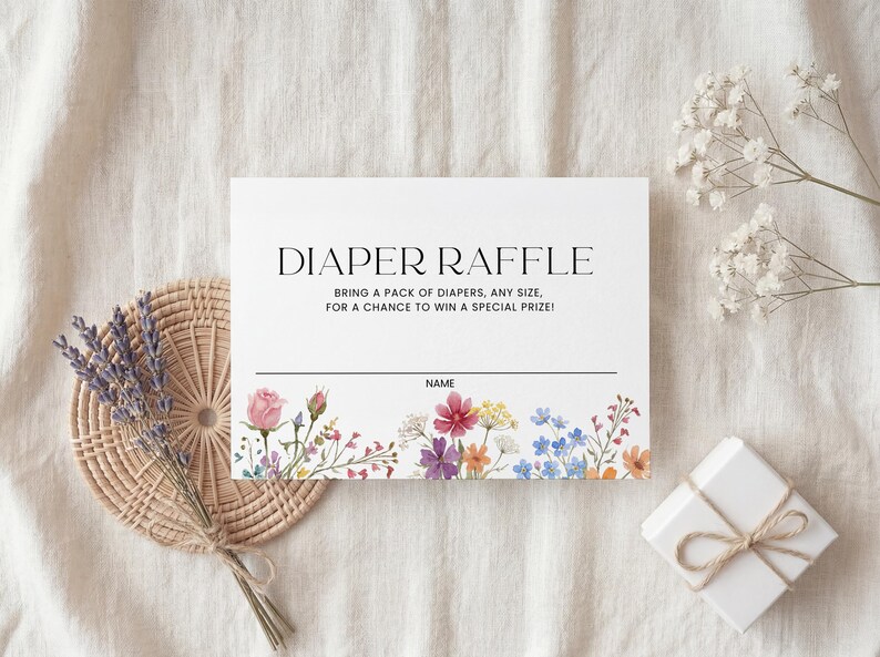 Collection of matching baby shower stationery designs including an invitation, diaper raffle ticket, books for baby card, and thank you note, all featuring a watercolor wildflower theme.