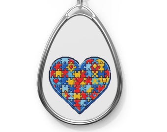 ハート型の自閉症啓発パズルピースネックレス｜ティアドロップペンダント｜複数のカラーオプションをご用意しています。