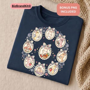 May include: Navy blue crew neck t-shirt featuring a circular design of cartoon bunnies in ornate frames. Each bunny is depicted with different accessories, including flowers, strawberries, and carrots. The text "BONUS PNG INCLUDED" is in the upper right corner.