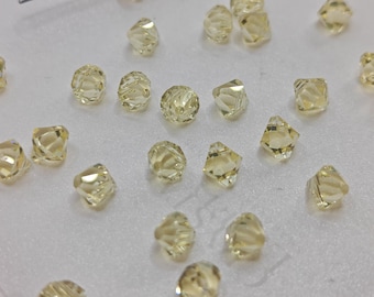 12 pieces Swarovski Crystal 6301 Top Drilled Bicone Pendant JONQUIL - Available in 6mm and 8mm
