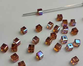 12 pieces Swarovski Crystal 5601 4mm CUBE - Topaz AB