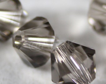 Perles de cristal Swarovski bicônes Xilion 5328 GREIGE en 3 mm, 4 mm, 5 mm et 6 mm - (choisissez les dimensions et la quantité)