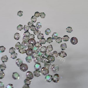 Swarovski Crystal Bicone Beads 5328 5301 Xillion Color : Crystal Paradise Shine , select quantity - Available in 3mm, 4mm, 5mm and 6mm