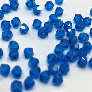 Swarovski Crystal BICONE Beads 5328 5301 CAPRI BLUE 3mm, 4mm, 5mm, 6mm and 8mm - ( choose quantity and sizes )