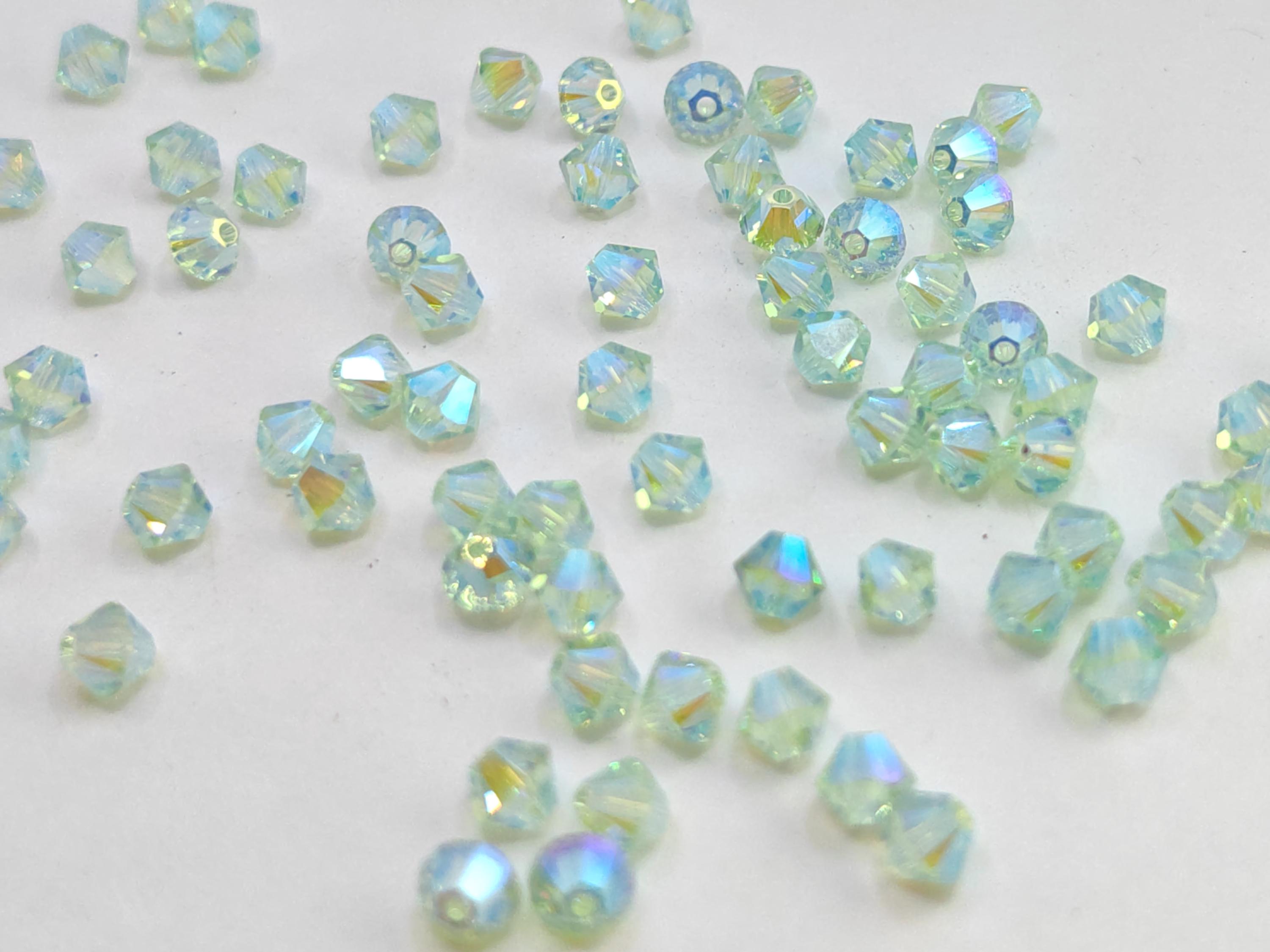 Swarovski Crystal 5328 4mm Xilion Bicone Beads - Chrysolite AB2X 