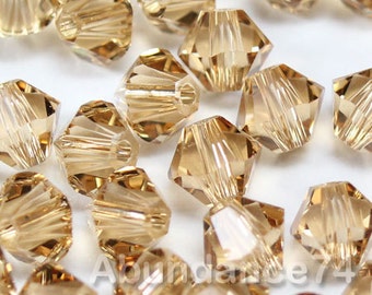 Swarovski Crystal Bicone Beads 5328 5301 LIGHT COLORADO TOPAZ 3mm, 4mm, 5mm, 6mm and 8mm - ( choose quantity and sizes )