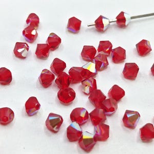 Swarovski Crystal Bicone Beads 5328 5301 LIGHT SIAM AB - Available in 3mm, 4mm, 5mm, 6mm and 8mm ( select quantity and sizes )