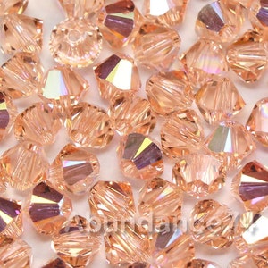 Swarovski Crystal Bicone Beads 5328 5301 LIGHT PEACH AB - Available in 3mm, 5mm, 6mm ( select quantity and sizes )