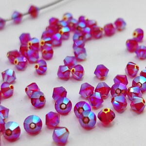 Swarovski Elements Crystal Xilion LIGHT SIAM AB2X Beads 5328 4mm - ( Aurora Borealis 2X ) Choose Quantity