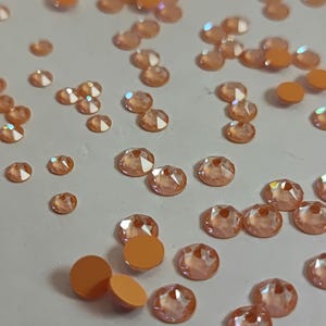 Swarovski Crystal 2088 Peach Delite Xirius No-Hotfix Rhinestone Flatbacks - Select quantity, Available Sizes: ss12,  ss16, ss20 ( New )