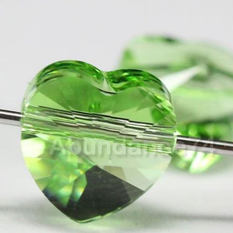 Swarovski Crystal Elements 8mm 5742 Heart Beads PERIDOT Select Quantity image 1
