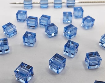 Koraliki Swarovski Crystal 5601 CUBE - LIGHT SAPPHIRE Wybierz ilości i rozmiary 4 mm, 6 mm i 8 mm