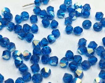Swarovski Kristall Doppelkegel 5328 5301 CAPRI BLUE AB - Erhältlich in 3 mm, 4 mm, 5 mm und 6 mm ( Größe und Menge auswählen )