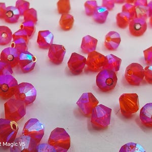 Swarovski Elements - Swarovski Crystal Beads 5328 4mm Xillion Beads - Hyacinth AB2X ( Select Quantity )