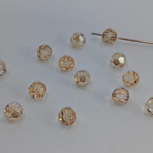 Swarovski Crystal 5000 Kugelperlen - Crystal Golden Shadow 4 mm, 6 mm, 8 mm und 10 mm ( Größen auswählen )