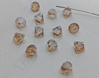 12 pieces Swarovski Crystal 6301 Top Drilled Bicone Pendant GOLDEN SHADOW - Available in 6mm and 8mm