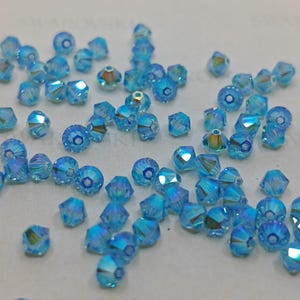 Swarovski Elements 5301 5328 Crystal Bicone Xillion Beads - AQUAMARINE AB2X 3mm, 4mm, 5mm and 6mm ( Select Sizes and Quantity )